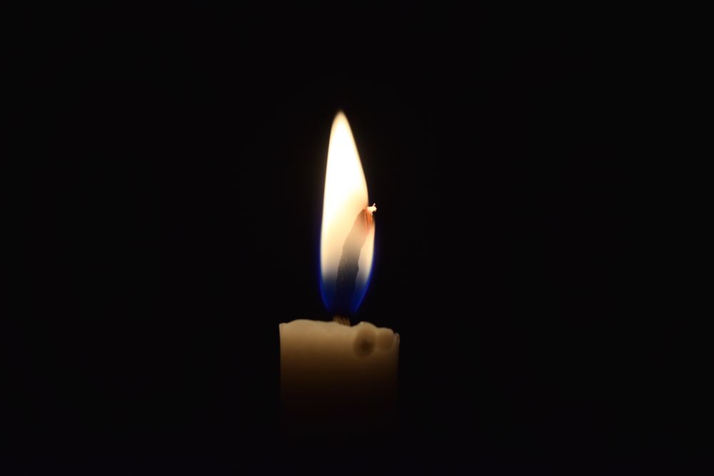 Candlelight lit in the dark