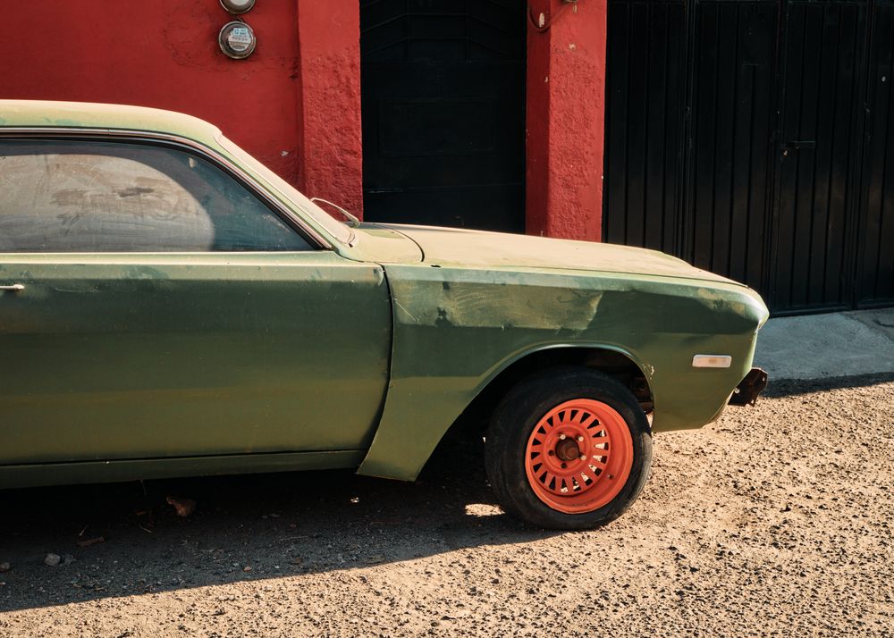 Side view of green vintage car