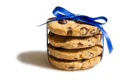 Closeup of chocolate chip cookies pile isolated on studio background