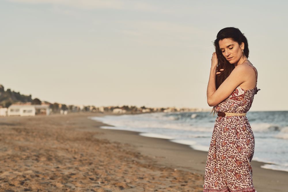 Woman with dress at the beach