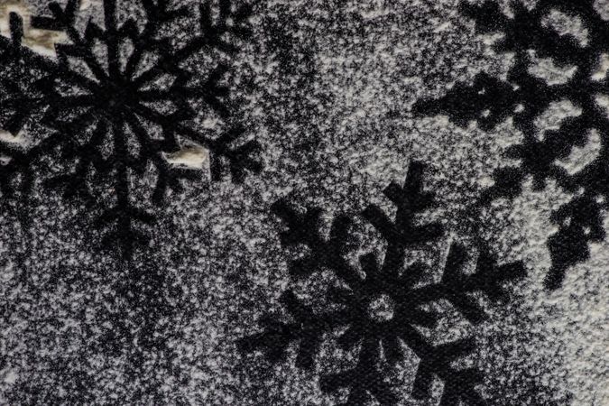 Close up of snowflake outline on counter