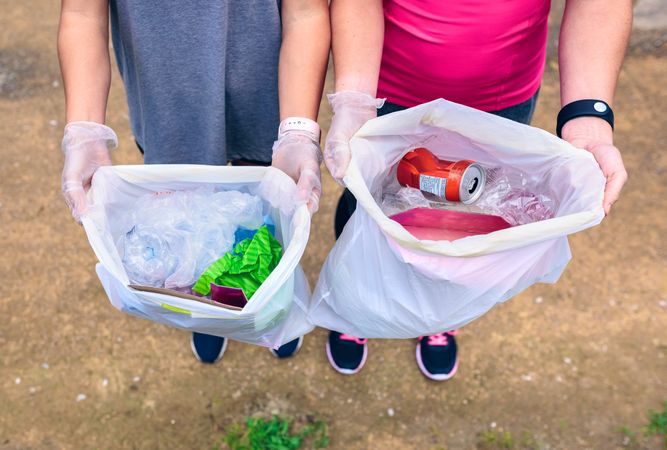 Plogging, females showing garbage