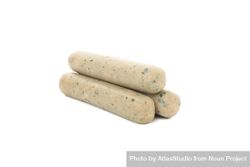 Light colored sausages stacked on blank background 5kAG3b