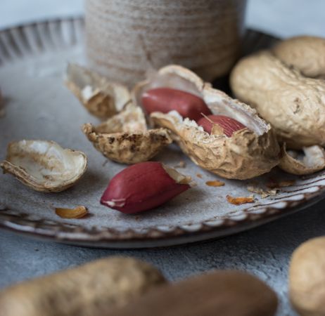 Fresh peanuts on vintage plate