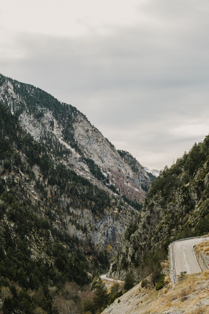 Countryside road between snow hills