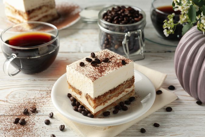 Composition with tasty tiramisu on wooden background. Delicious dessert