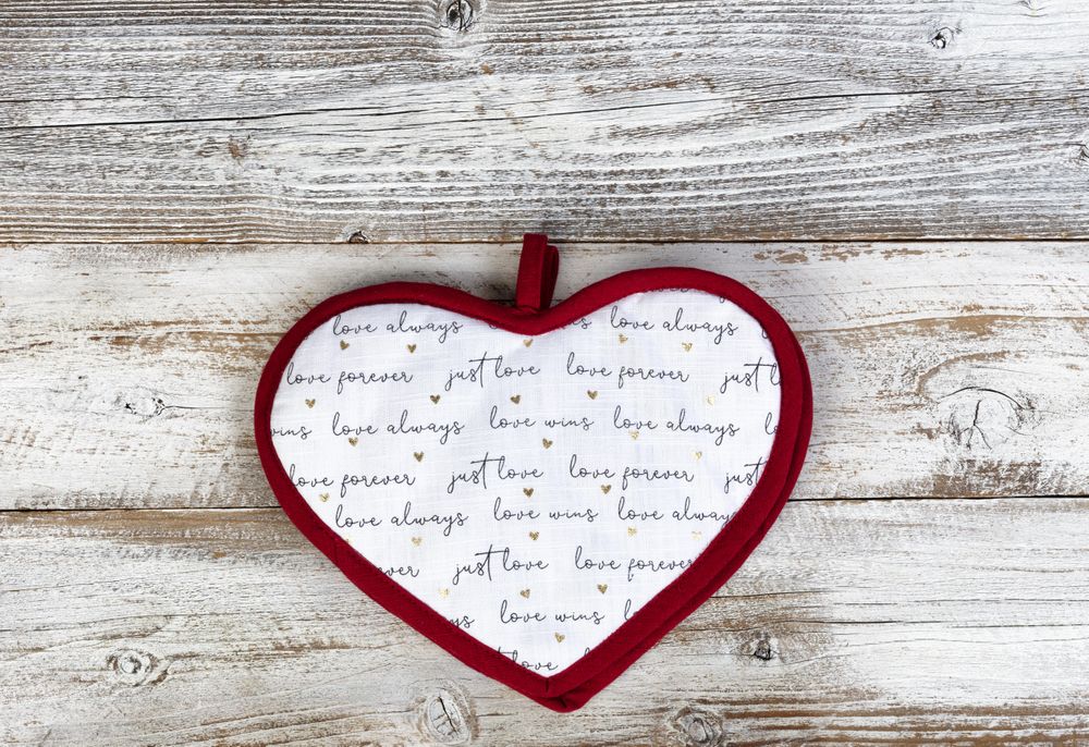 Valentine’s day pot holder on age wood