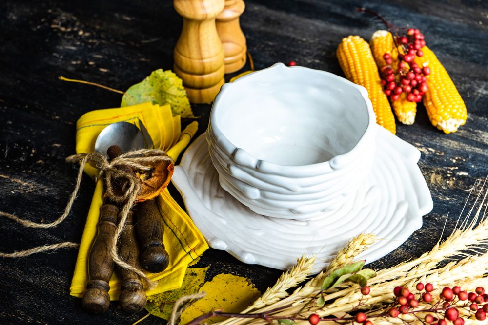 Porcelain birds nest bowl with autumnal decor