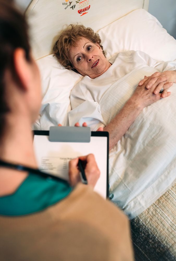 Female doctor filling out a questionnaire