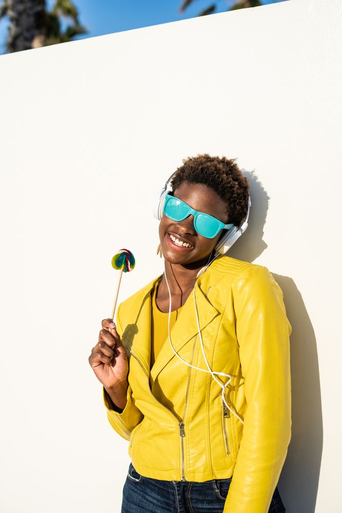 Black woman eating candy