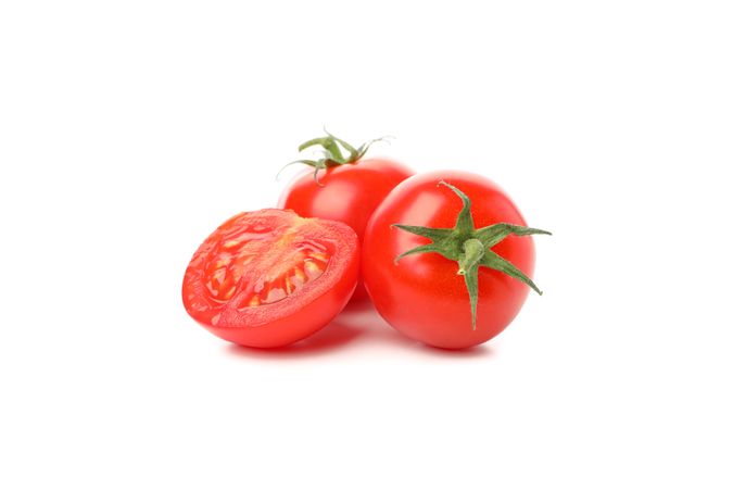 Fresh ripe tomatoes isolated on plain background