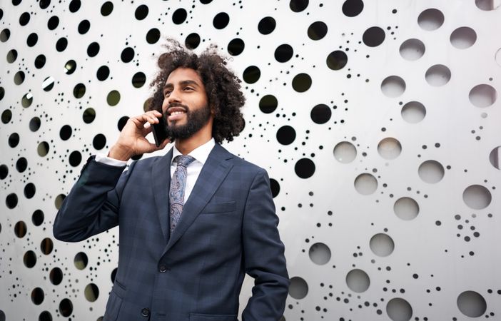 Presentable businessman during phone conversation