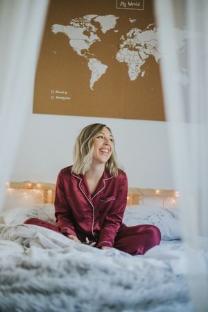Woman sitting in bed