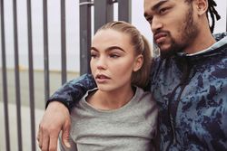 Attractive couple looking away with distracted facial expressions