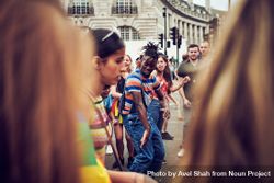 London, England, United Kingdom - July 7th, 2019: Man dancing at pride shot between the crowd 4ZewN5