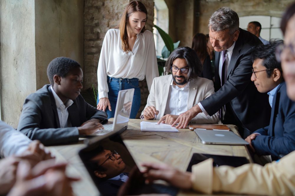 Diverse business team reviewing documents