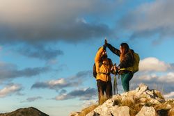 people hiking in the mountains