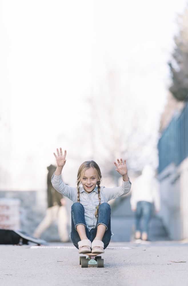 Kid playing with skateboard