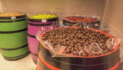 Chocolate candies in wooden barrel