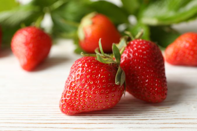 Tasty strawberry on wooden background. Summer berry