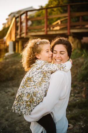 Mother with her daughter at beach