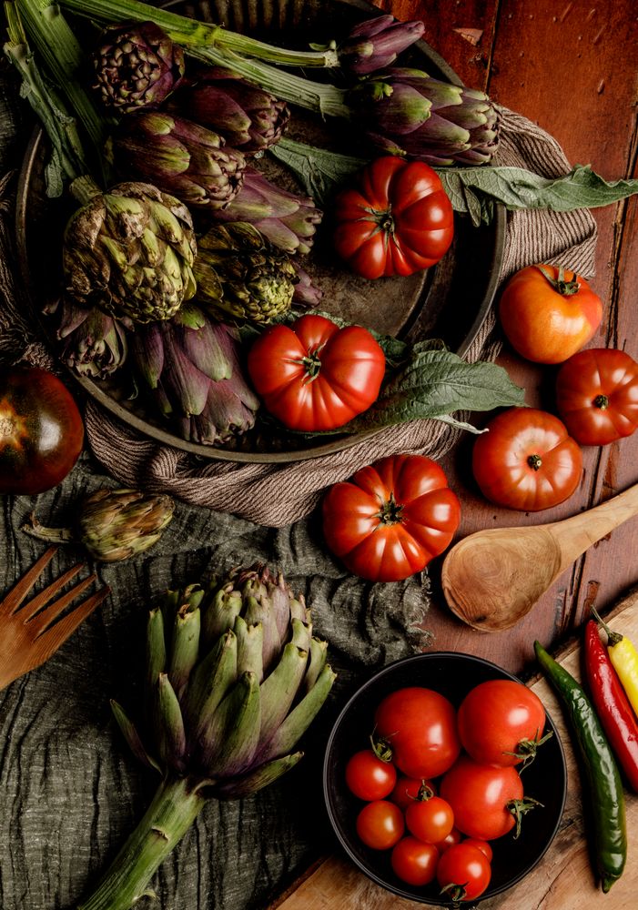 Assorted vegetables and napkins on table