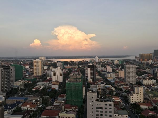City with high rise buildings under clouds in Phnom Penh, Cambodia