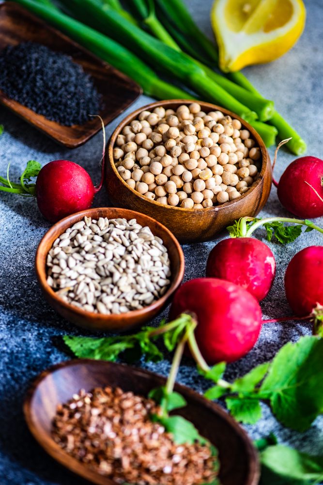 Fresh ingredients of grains, radishes and lemon slices
