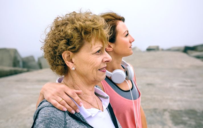 Two sportswoman looking away