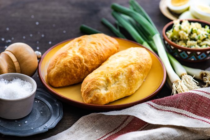 Traditional Georgian savory pies with eggs, rice and green onion 