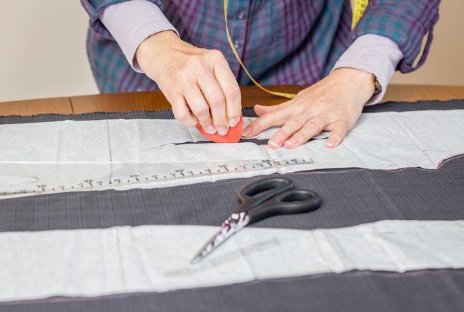 Dressmaker design tailor pattern on the table