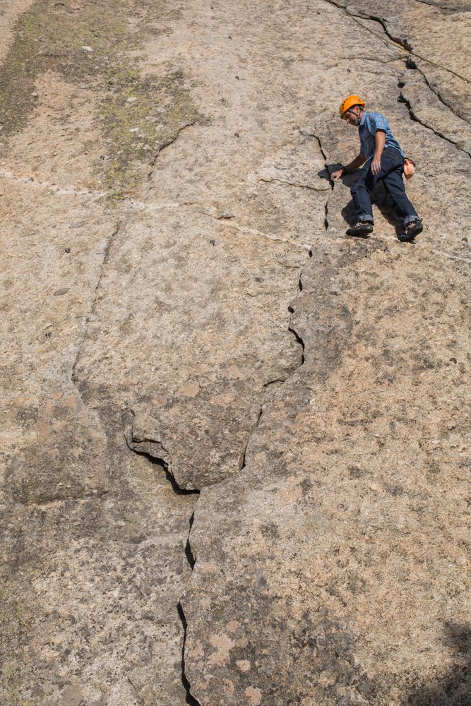 Free climber climbing in nature