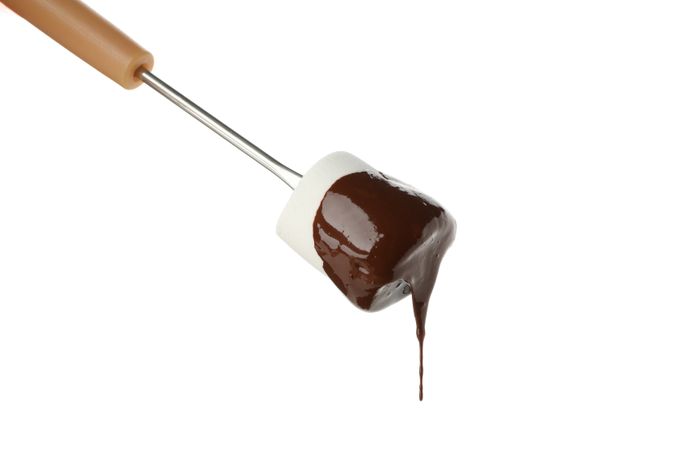 Marshmallow in chocolate sauce isolated on blank background