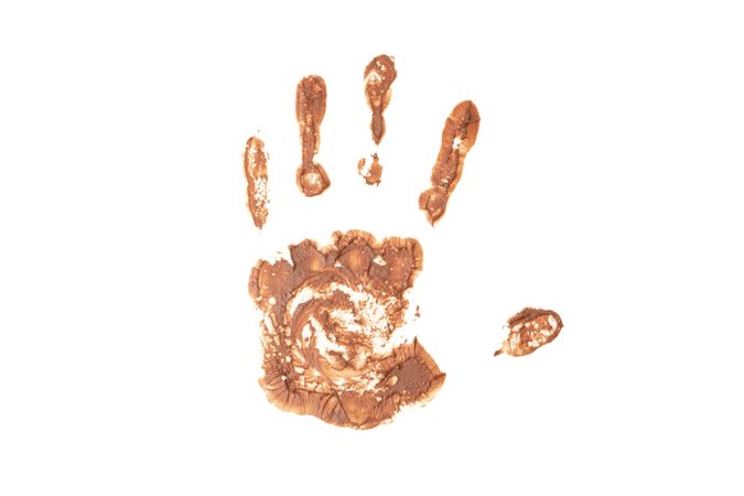 Handprint with chocolate isolated on blank background