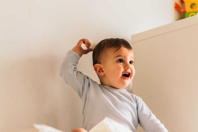 adorable baby sitting portrait at home