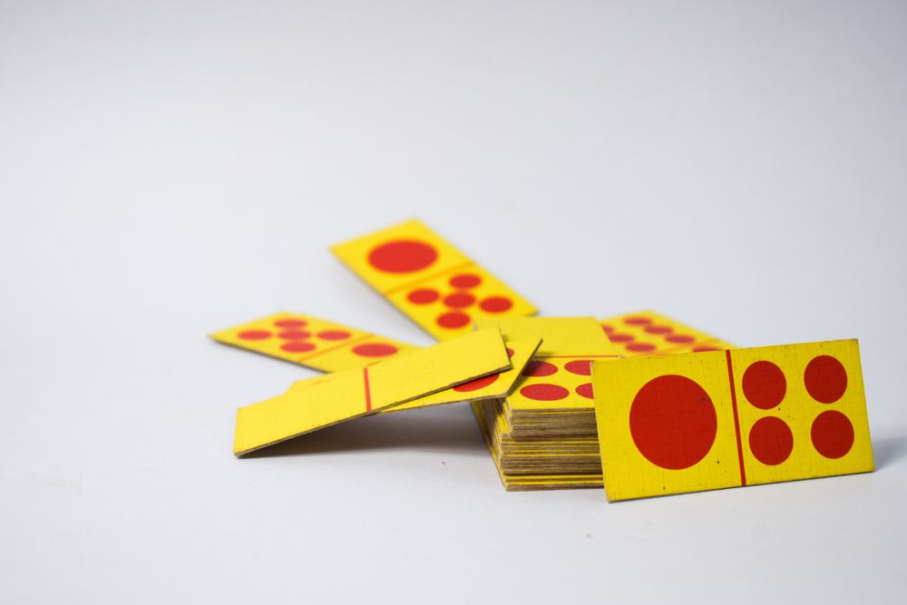Pile of red and yellow domino cards