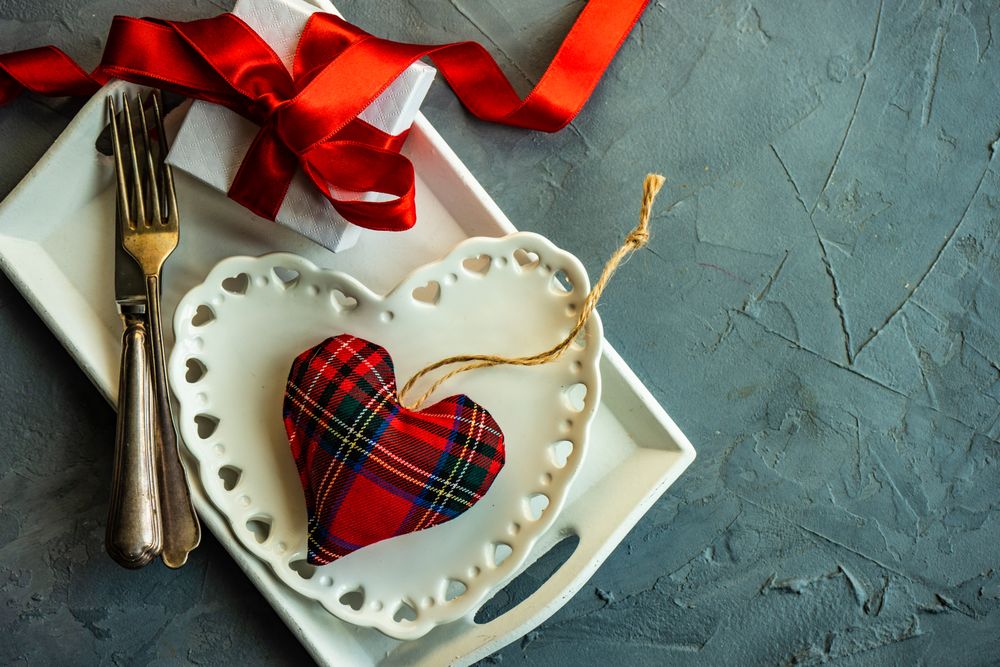 St. Valentine day table setting with heart plate