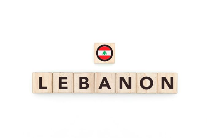 Wooden blocks bearing the name and flag of Lebanon.