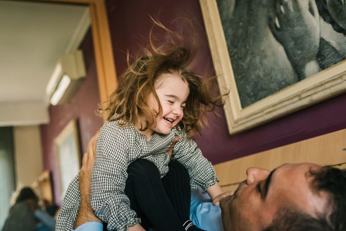 Father playing with daughter