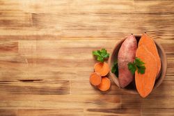 Concept of vegetables, sweet potato, space for text