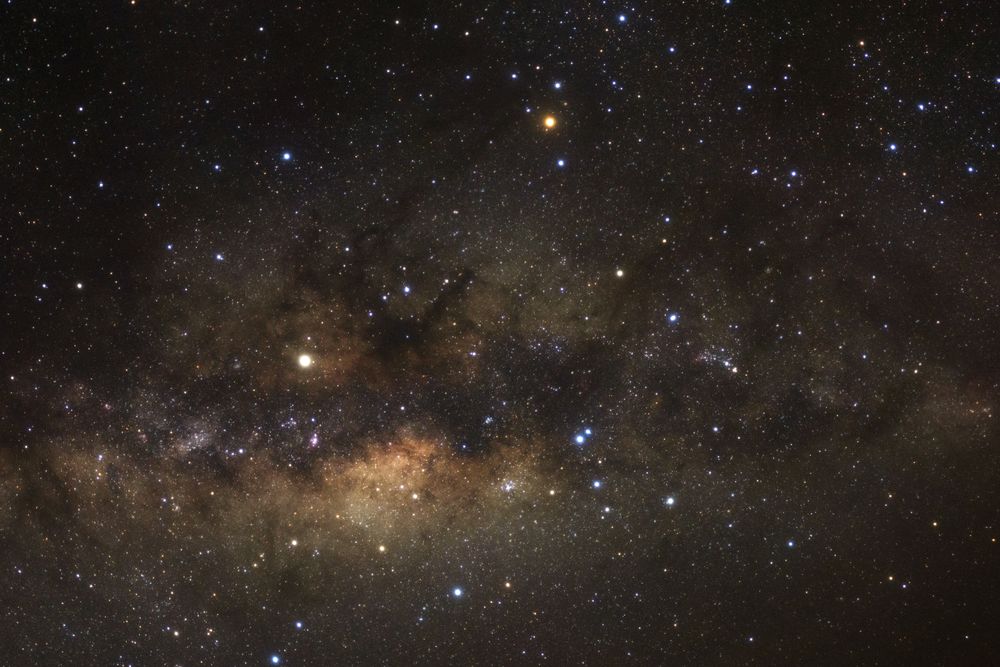 Milky way galaxy with stars and space dust in the universe, Long exposure photograph, with grain.