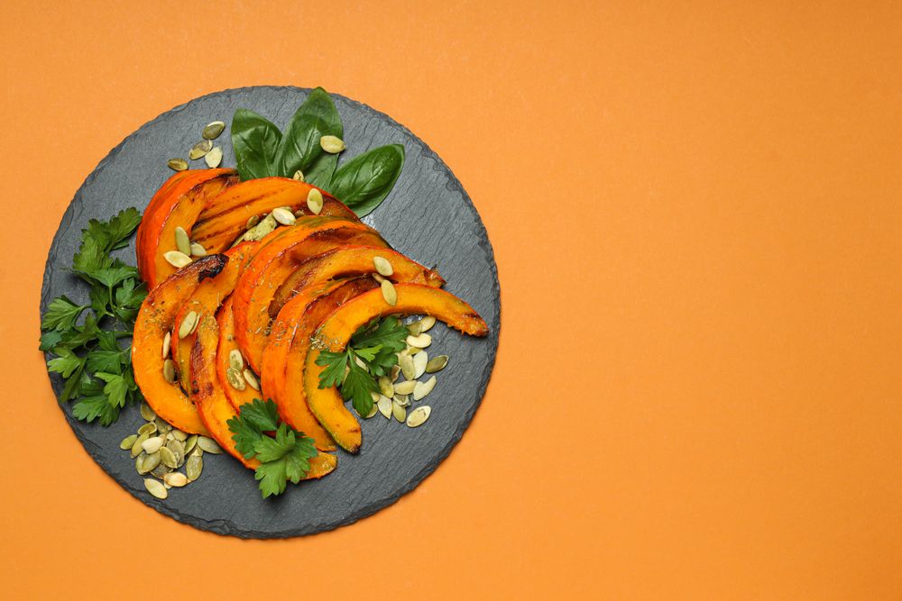 Concept of tasty homemade dish - baked pumpkin