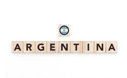 Wooden blocks bearing the name and flag of Argentina. Latin and South American Culture, national identity, travel, and geography in a copy space design.