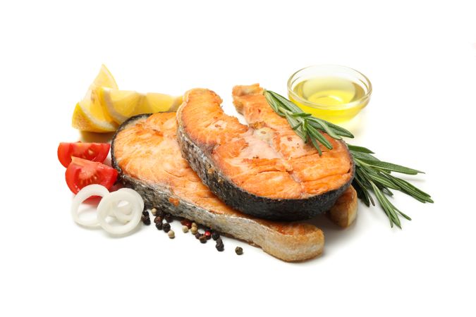 Tasty grilled salmon and ingredients isolated on blank background