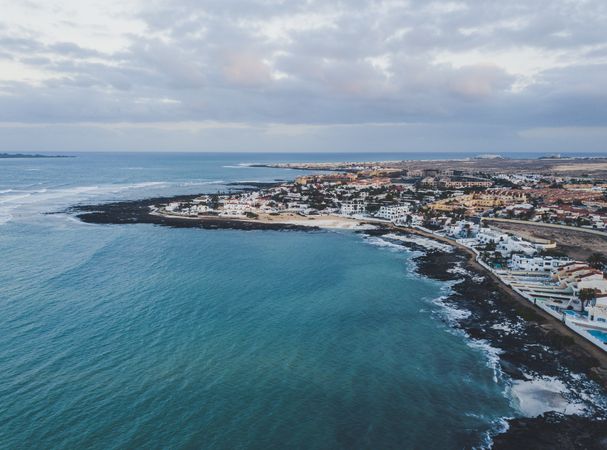 Scenic aerial view of city on ocean shore