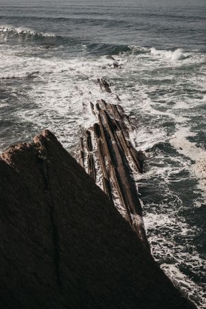 Cliff near stormy sea