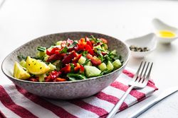 Big grey bowl of fresh salad