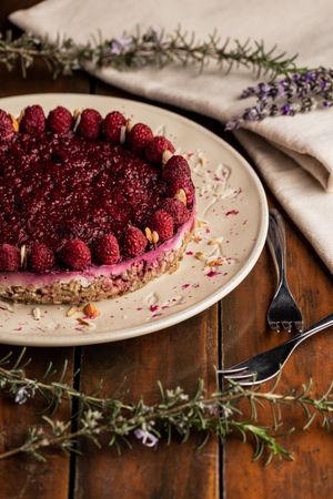 Fruit berry pie and branch of lavender on table