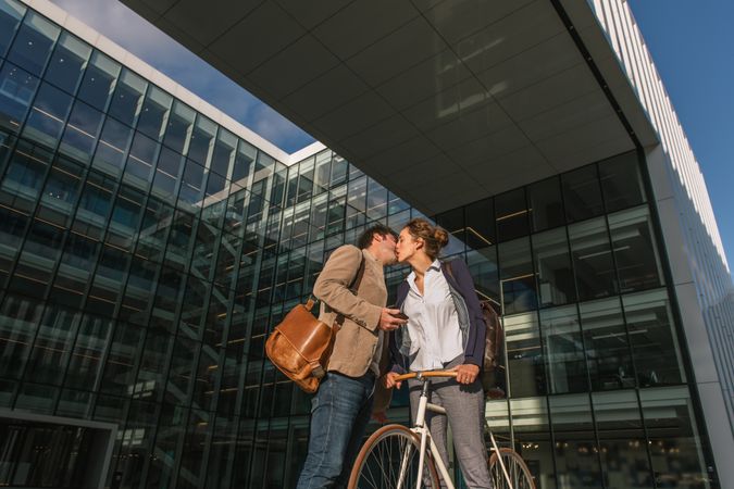 Couple kissing each other after work