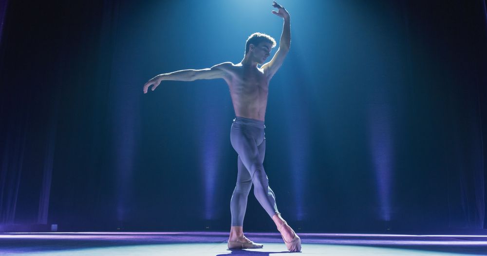 Graceful Classical Ballet Male Dancer Performing his Choreography Professionally